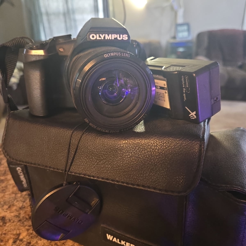 Olympus Black Digital Camera with Lens